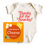 Chunky Deli product image: "Little Books Culinary Collection" box set (purple, with character illustrations) placed on top of a natural-colored "Thanks for the Snacks!" bodysuit (100% cotton).