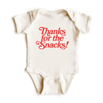 Chunky Deli product image: Natural-colored "Thanks for the Snacks!" bodysuit, 100% cotton with envelope shoulders and three-snap closure, laid flat on a white background.
