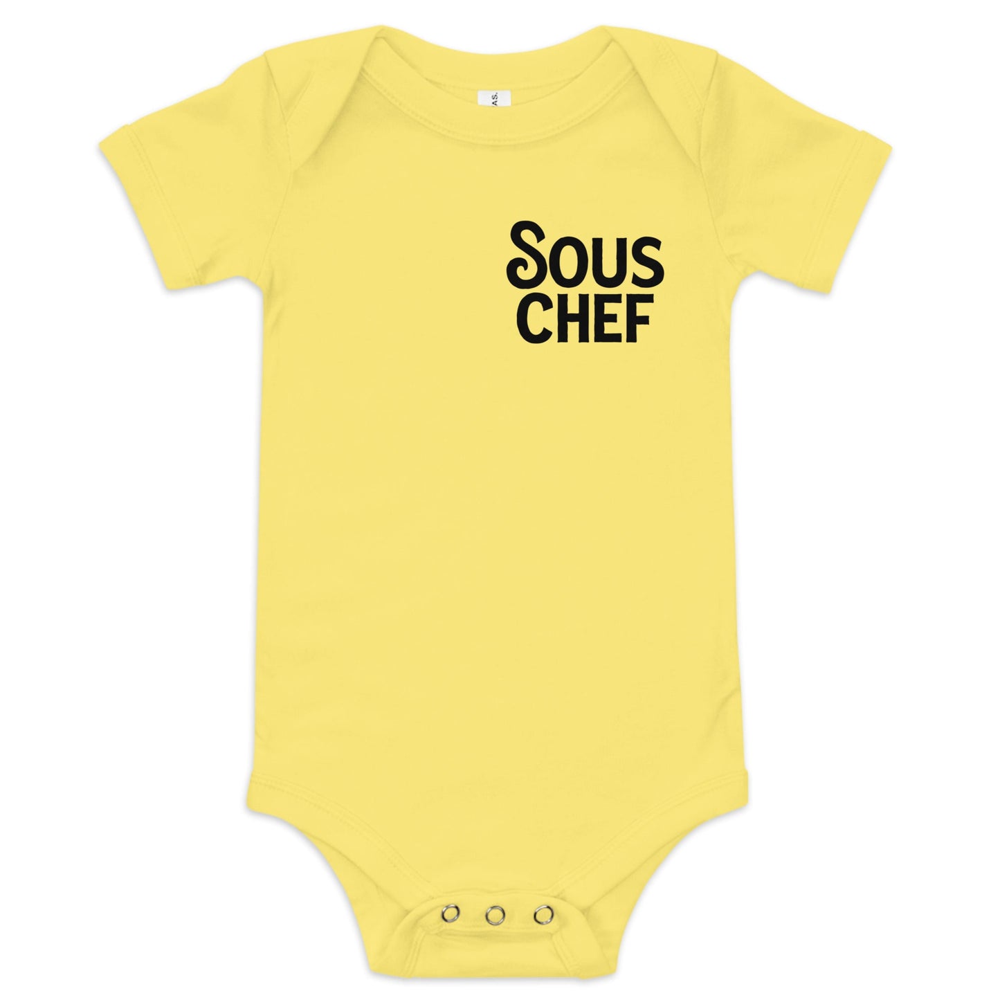 Chunky Deli product image: Yellow-colored "Sous Chef" bodysuit (100% cotton) laid flat on a white background, showcasing the envelope shoulders and three-snap closure.