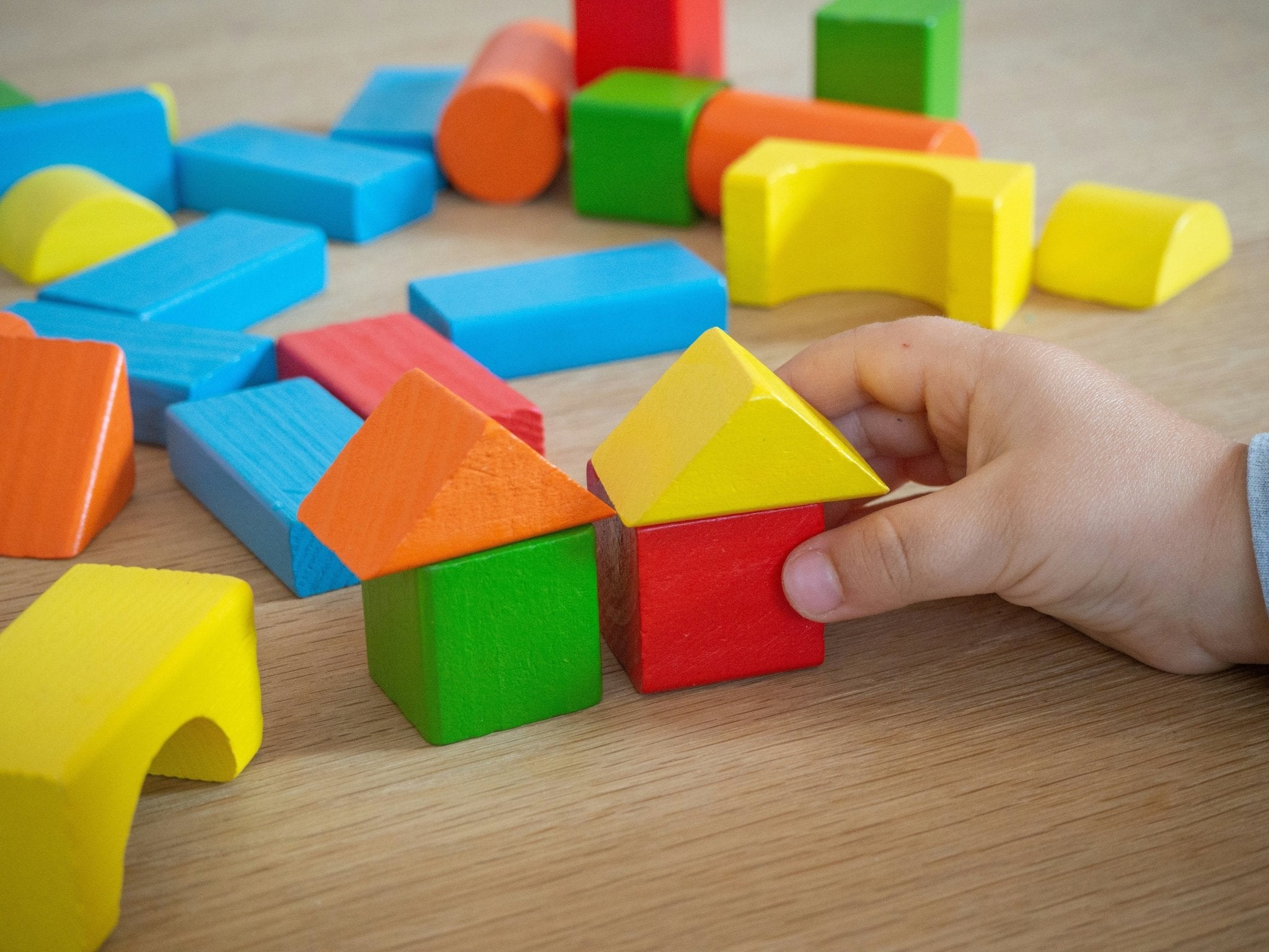 The Secret to Independent Play: Why Toddlers Need Open-Ended Wooden Toys