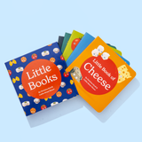 Chunky Deli Product Image: Little Books: Starter Collection boxed set containing five board books: Little Book of Cheese, Little Book of Cookies, Little Book of Fungi, Little Book of Cookies, and Little Book of Pasta, peaking out of the case, fanned out o