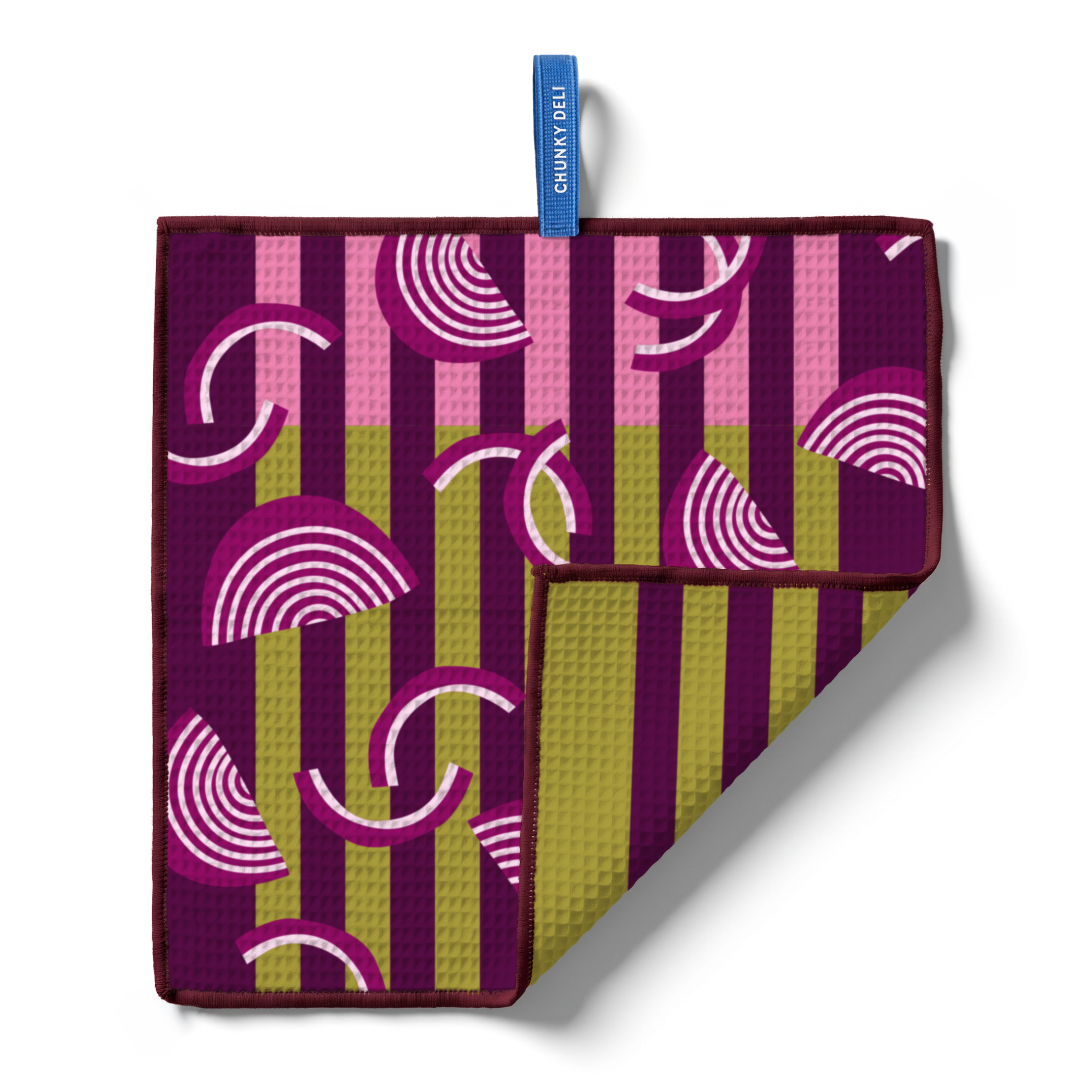 Chunky Deli product image of a colorful, patterned towel with an onion themed design on a white background