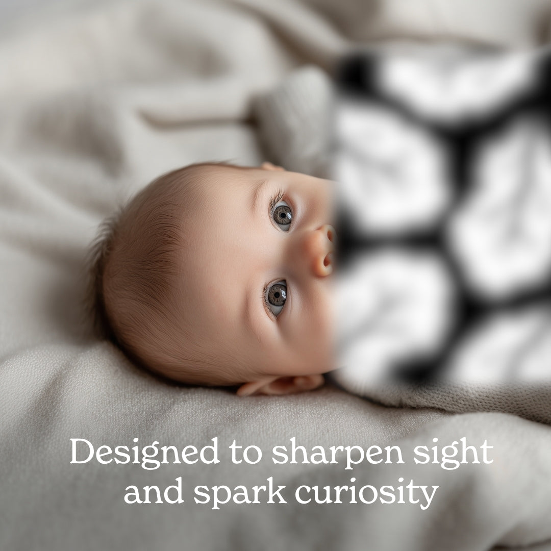 Baby looking at Chunky Deli high-contrast art cards. Text reads: Designed to sharpen sight and spark curiosity.