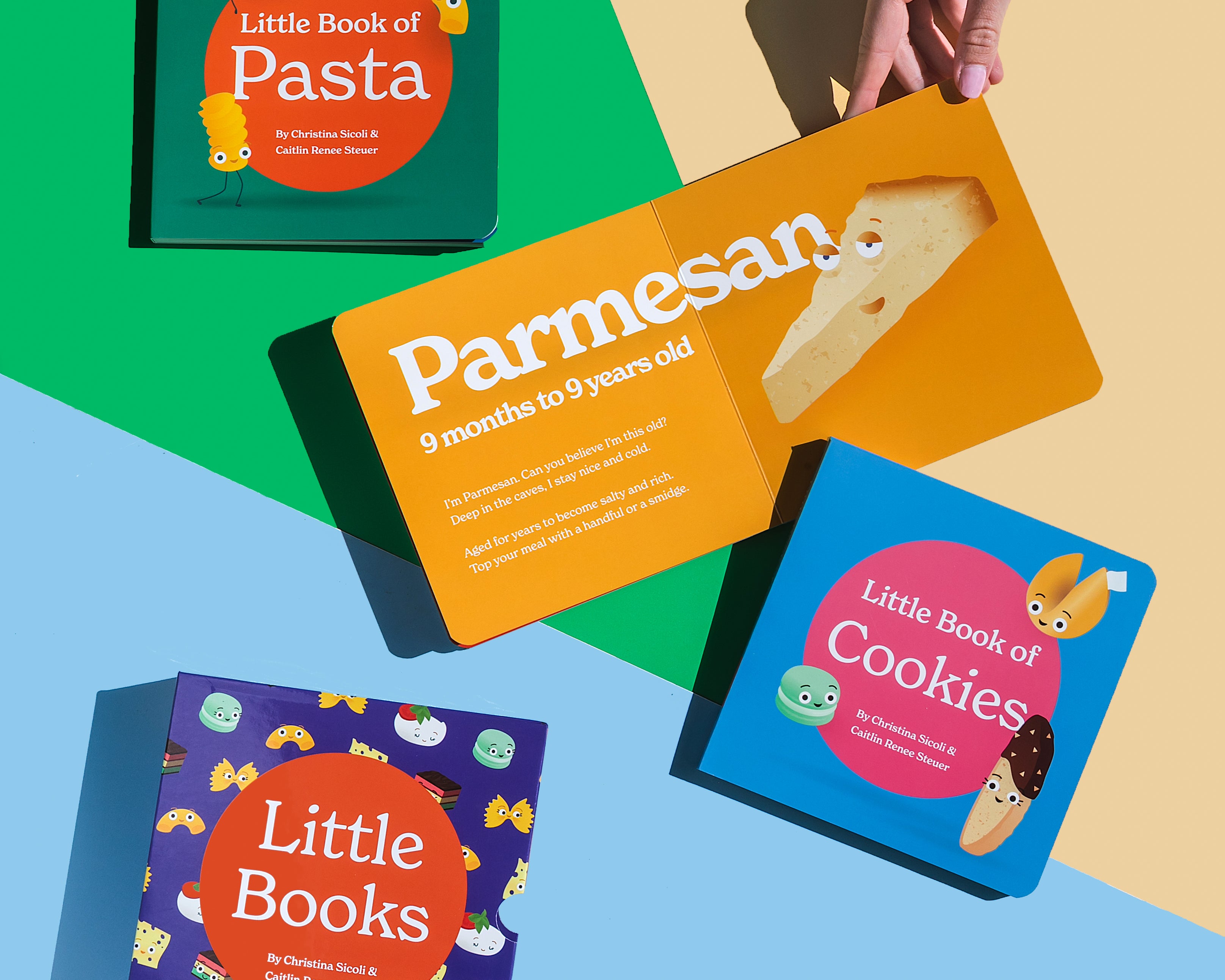 A hand holds open a copy of "Little Book of Cheese" on a green and blue background, revealing the orange page for "Parmesan." Other books from the Chunky Deli collection, including "Little Book of Pasta," "Little Book of Cookies," and "Little Books," are also visible.