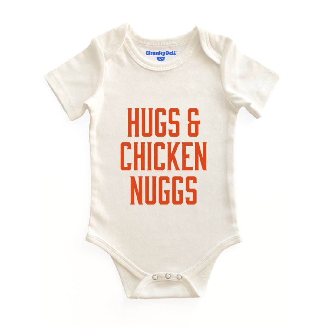 Chunky Deli product image: Natural-colored "Hugs & Chicken Nuggs" bodysuit (100% cotton) laid flat on a white background, showcasing the envelope shoulders and three-snap closure.