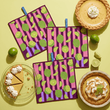 Chunky Deli product image of three matching lime patterned cleanup cloths with key lime pies and limes on a lime green table.