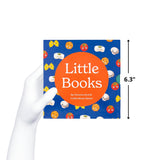 A hand holding the Little Books: Starter Collection box set by Chunky Deli, showing a height of 6.3 inches. The blue slipcase features colorful food character illustrations.