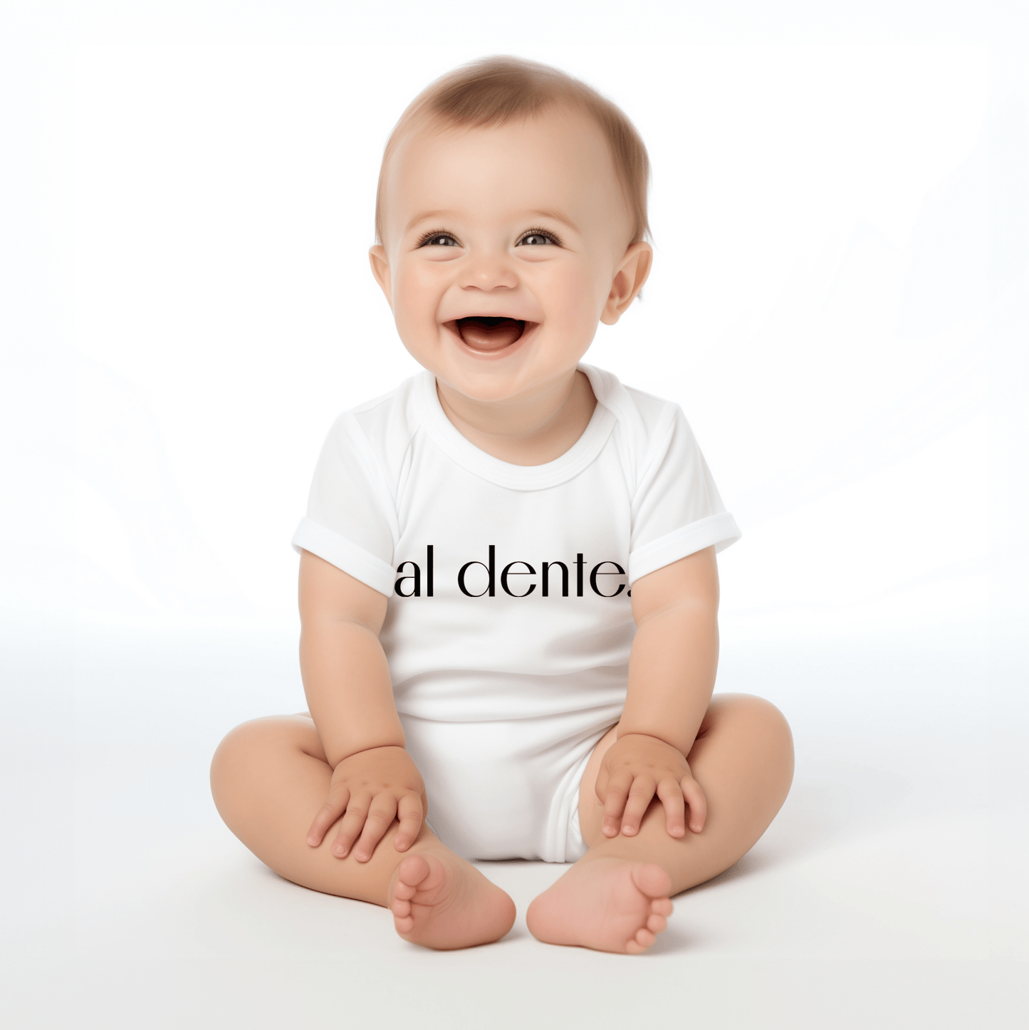 Chunky Deli product image: Happy, smiling baby wearing the "Al Dente" bodysuit, showcasing the short sleeves, envelope shoulder, and graphic design across the chest. White background.