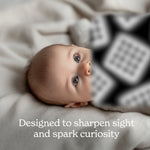 Baby looking at Chunky Deli high-contrast art cards. Text reads: Designed to sharpen sight and spark curiosity.
