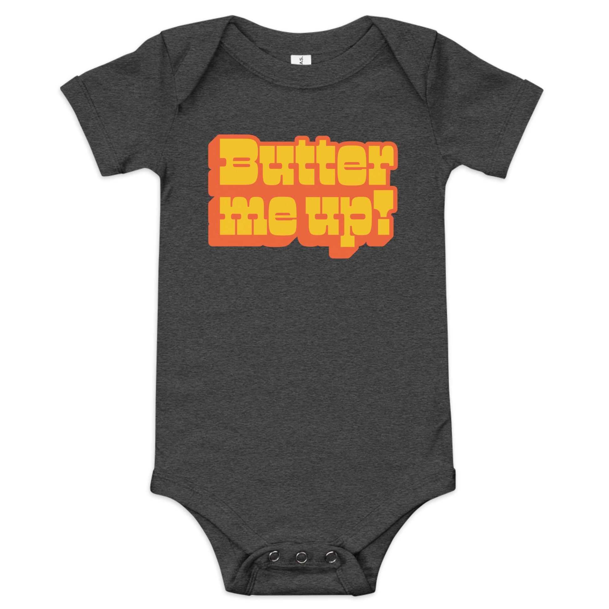 Chunky Deli product image: "Butter Me Up" onesie (100% cotton, black color) laid flat on a white background, showcasing the envelope shoulders, short sleeves, three-snap closure, and the text "Butter Me Up" printed in orange and red across the chest.