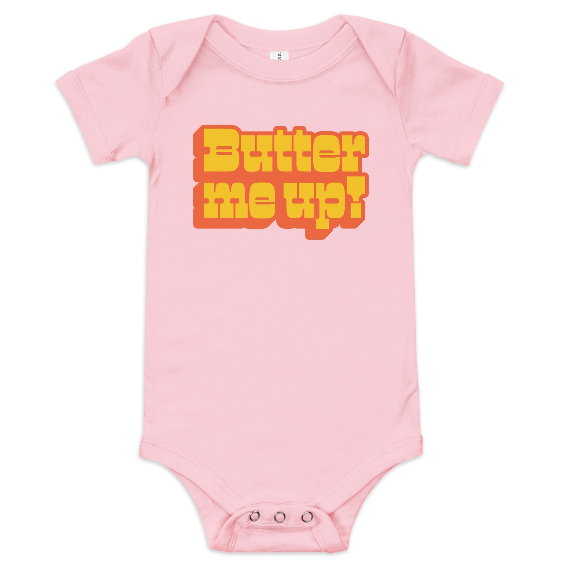 Chunky Deli product image: "Butter Me Up" onesie (100% cotton, pink color) laid flat on a white background, showcasing the envelope shoulders, short sleeves, three-snap closure, and the text "Butter Me Up" printed in orange and red across the chest.