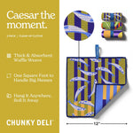 Chunky Deli Caesar The Moment cleaning cloths with packaging and features on a green background