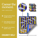 Chunky Deli Caesar The Moment cleaning cloths with packaging and features on a green background