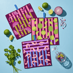 Chunky Deli product image of colorful patterned towels featuring lime, onion and shrimp graphics with lime and onion & cilantro on a blue table