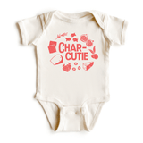 Chunky Deli product image: Natural-colored "Charcutie" bodysuit, 100% cotton with envelope shoulders and three-snap closure, laid flat on a white background.