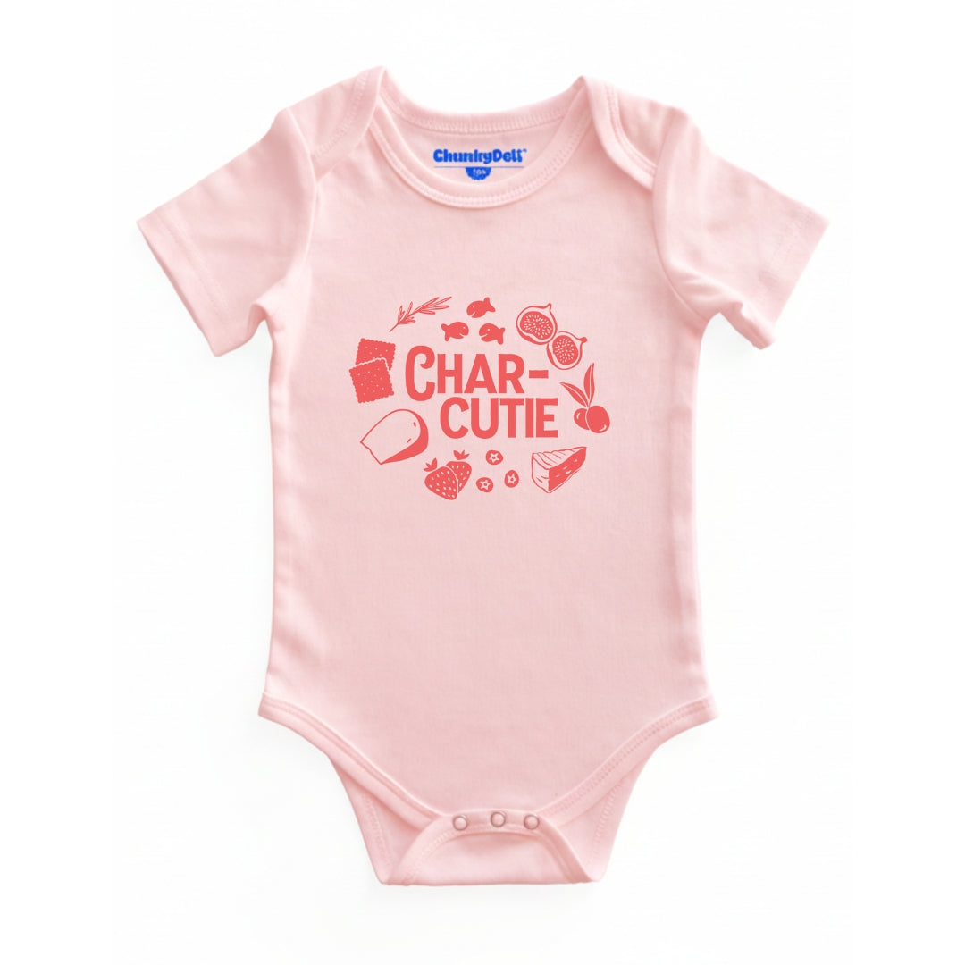 Chunky Deli product image: Pink-colored "Charcutie" bodysuit, 100% cotton with envelope shoulders and three-snap closure, laid flat on a white background.