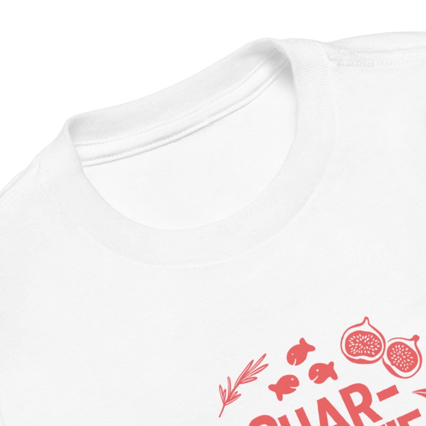 Chunky Deli product image: White short-sleeved kids' and toddler t-shirt with the text "Charcutie" in orange font, surrounded by illustrations of charcuterie board foods, on the chest. This is a close up shot of the neckline.
