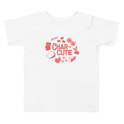 Chunky Deli product image: White short-sleeved kids' and toddler t-shirt with the text "Charcutie" in orange font, surrounded by illustrations of charcuterie board foods, on the chest.