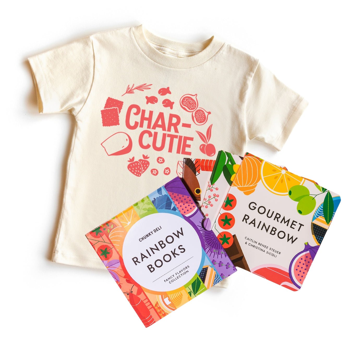 Chunky Deli "Fancy Flavors Collection" featuring a nude, 100% cotton, short sleeve toddler tee with a "CHAR-CUTIE" graphic in red, accompanied by the "Rainbow Books Fancy Flavors Collection" slipcase and individual books: "Gourmet Rainbow" by Caitlin Rene