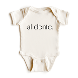  Chunky Deli product image: Natural-colored "Al Dente" bodysuit 100% cotton with envelope shoulders and three-snap closure, laid flat on a white background.