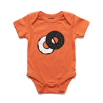 Chunky Deli Product Image: Orange baby onesie with a two tone graphic of an everything bagel with cream cheese on a white background