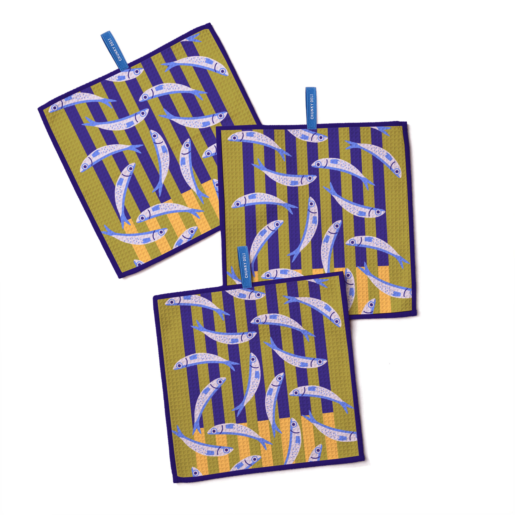 Three Chunky Deli kitchen towels with Anchovy fish pattern and stripes on a white background