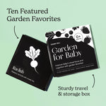 Black and white Garden for Baby art card set on a mint green background with two arrows pointing to the cards and box, outlining the features.
