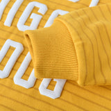 Close-up of Hot Diggity Dog Kids Crewneck Sweater highlighting soft fabric and ribbed cuff in bright orange stripes.