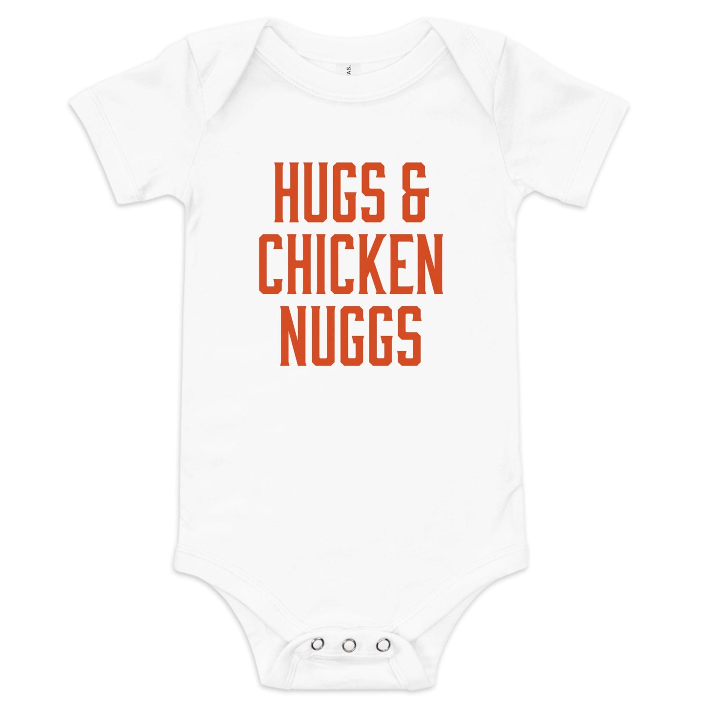 Chunky Deli product image: "Hugs and Chicken Nugs" bodysuit (100% cotton, natural color) laid flat on a white background, showcasing the envelope shoulders, short sleeves, three-snap closure, and the text "Hugs and Chicken Nugs" in orange font on the ches