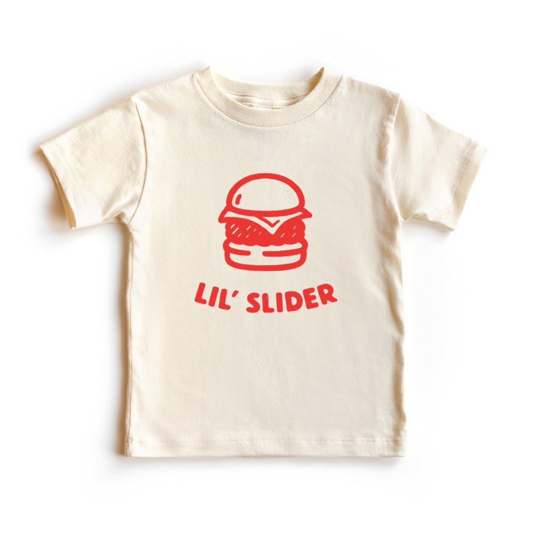 Chunky Deli product image: Toddler tee in 100% cotton, short sleeve, beige/natural color. Features a graphic illustration of a burger with the text "Lil' Slider" underneath, centered on the chest.