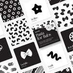 Chunky Deli product image: "Pasta for Baby" high-contrast black and white art cards box cover in the center, surrounded by example cards arranged in a grid format to showcase the front and back of each design. White background.