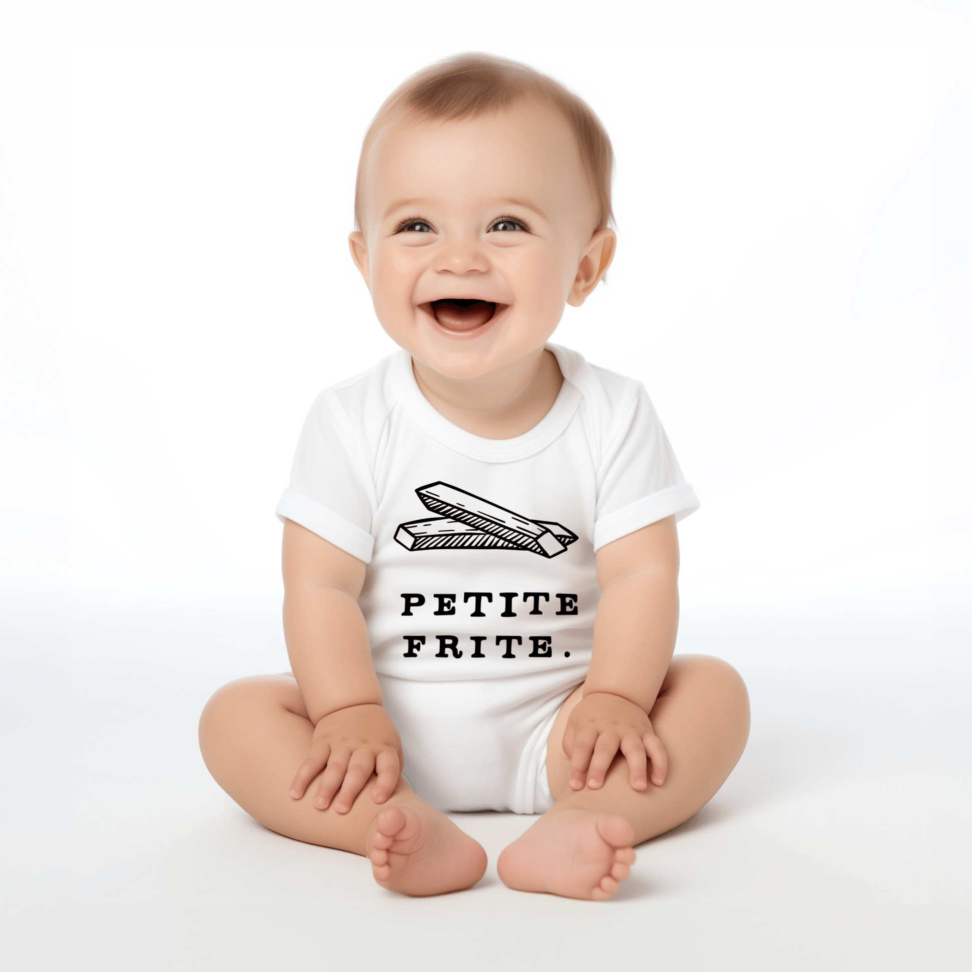 Chunky Deli product image: Happy, smiling baby wearing the "Petite Frite" bodysuit, showcasing the short sleeves, envelope shoulder, and graphic design across the chest. White background.