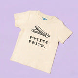 Chunky Deli product image: Toddler tee in 100% cotton, short sleeve, beige/natural color. Features a graphic illustration of fries with the text "Petite Frite" underneath, centered on the chest.
