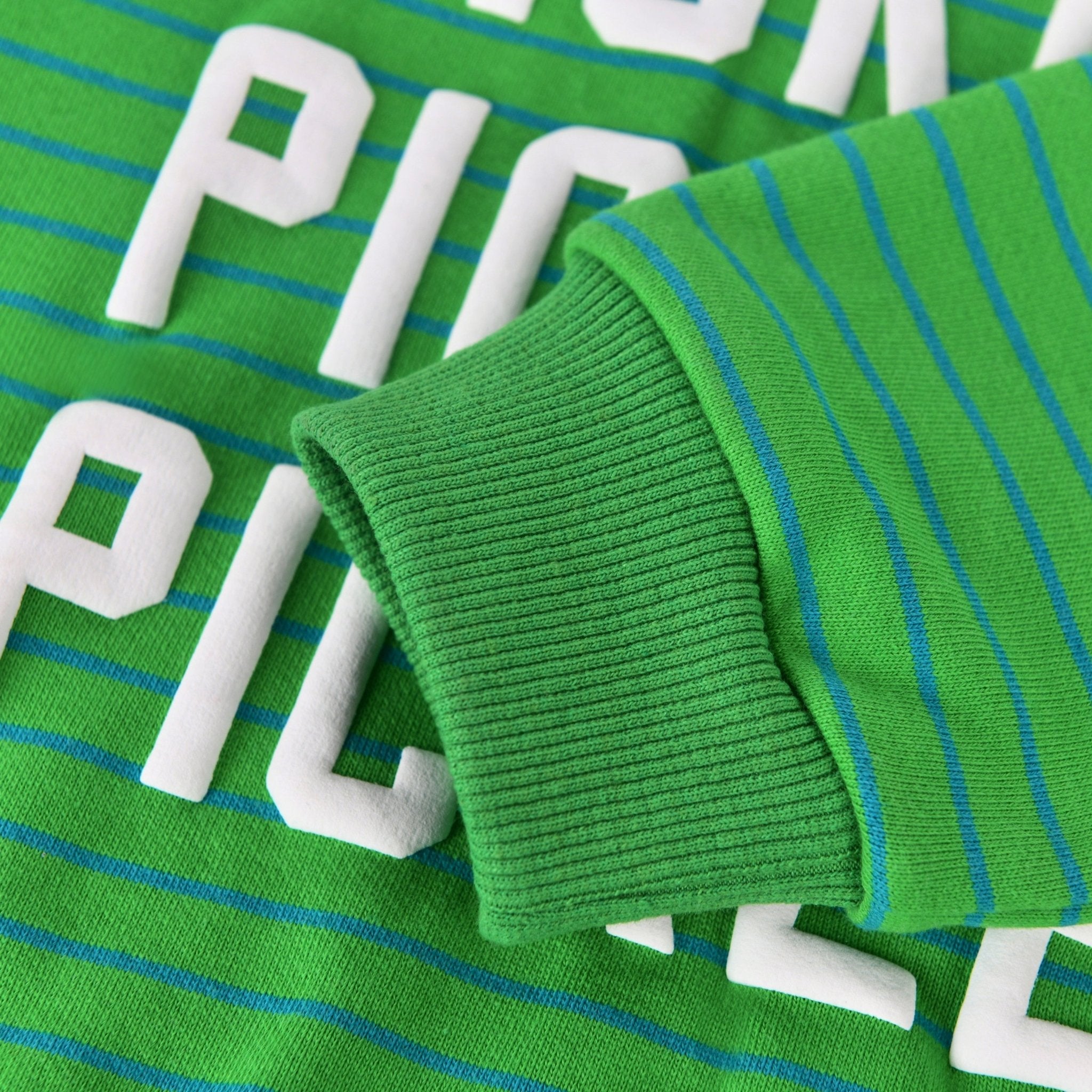 Pickles Kids Crewneck Sweater featuring soft, 100% Cotton fabric and a chunky deli design in green stripes.