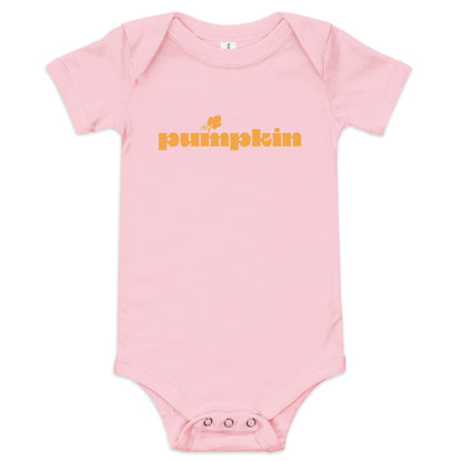 Chunky Deli product image: "Pumpkin" onesie (100% cotton, pink color) laid flat on a white background, showcasing the envelope shoulders, short sleeves, three-snap closure, and the text "Pumpkin" printed in orange across the chest.