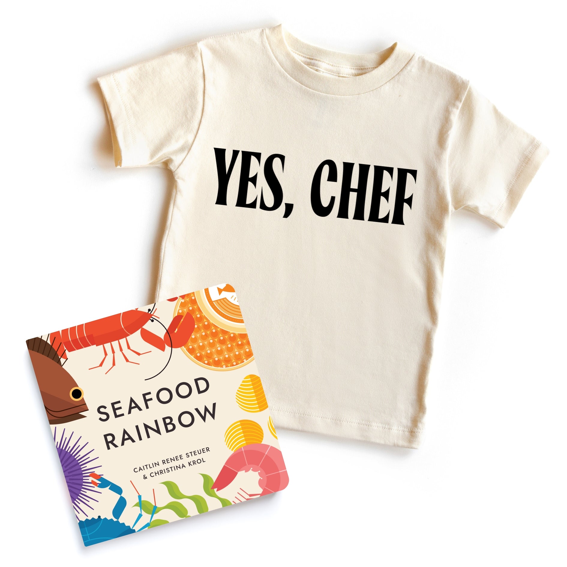 Chunky Deli bundle: 'Yes, Chef' toddler tee, 100% cotton, nude, short sleeve with bold black text. Includes 'Seafood Rainbow' by Christina Sicoli and Caitlin Renee Steuer, 6x6 board book, 20 pages, colorful sea creatures and poems.