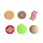 Components of stacking burger toy from chunky deli laid out on a 2X3 grid, featuring the different hook and loop fastener components to the toy. The top and bottom bun are featured, as well as the burger patty, tomato, bacon and lettuce. 