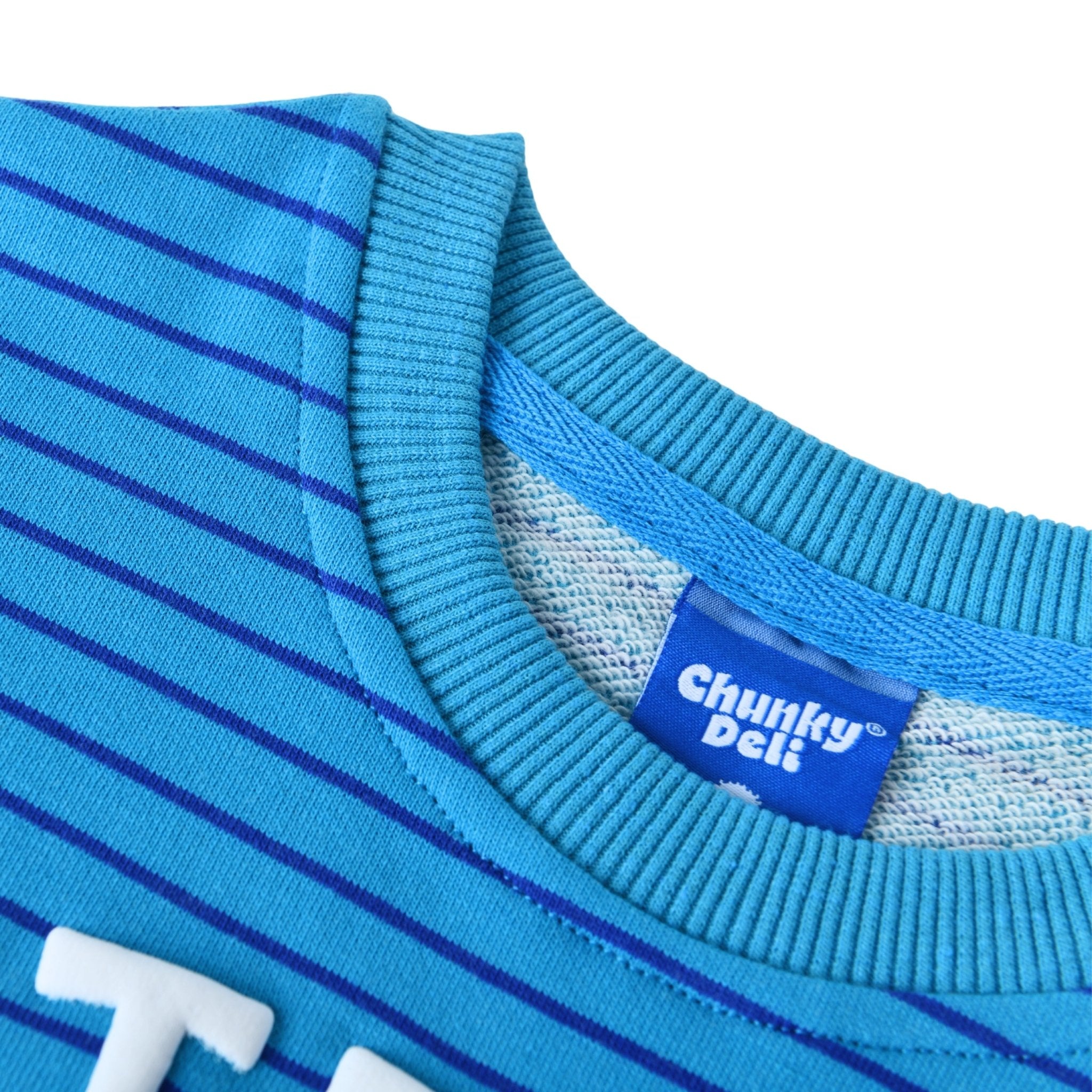 String Cheese Kids Crewneck Sweater featuring Chunky Deli logo and vibrant teal stripes.