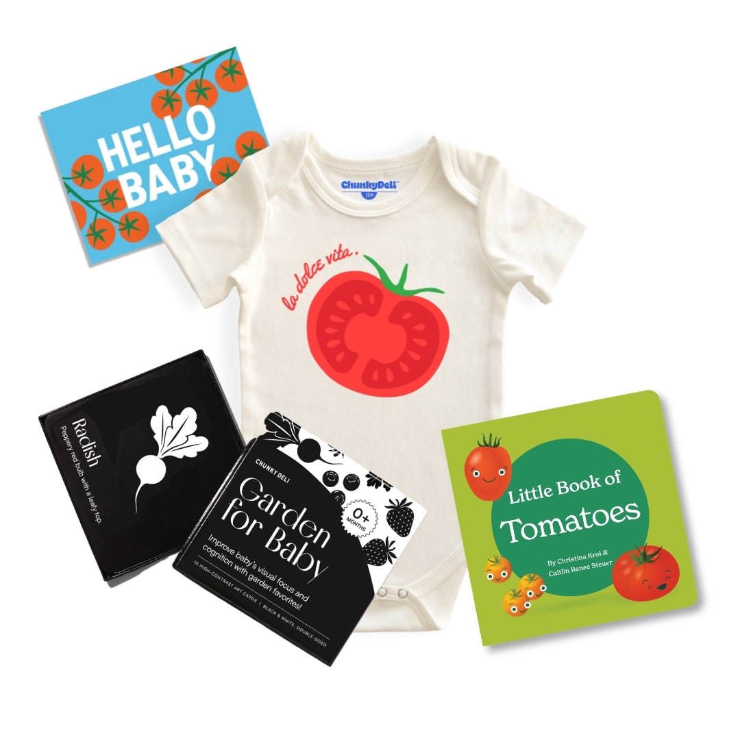 Baby onesie with tomato design, 'Hello Baby' card, 'Garden for Baby' cards, and 'Little Book of Tomatoes' on a white background. Chunky Deli Product Image